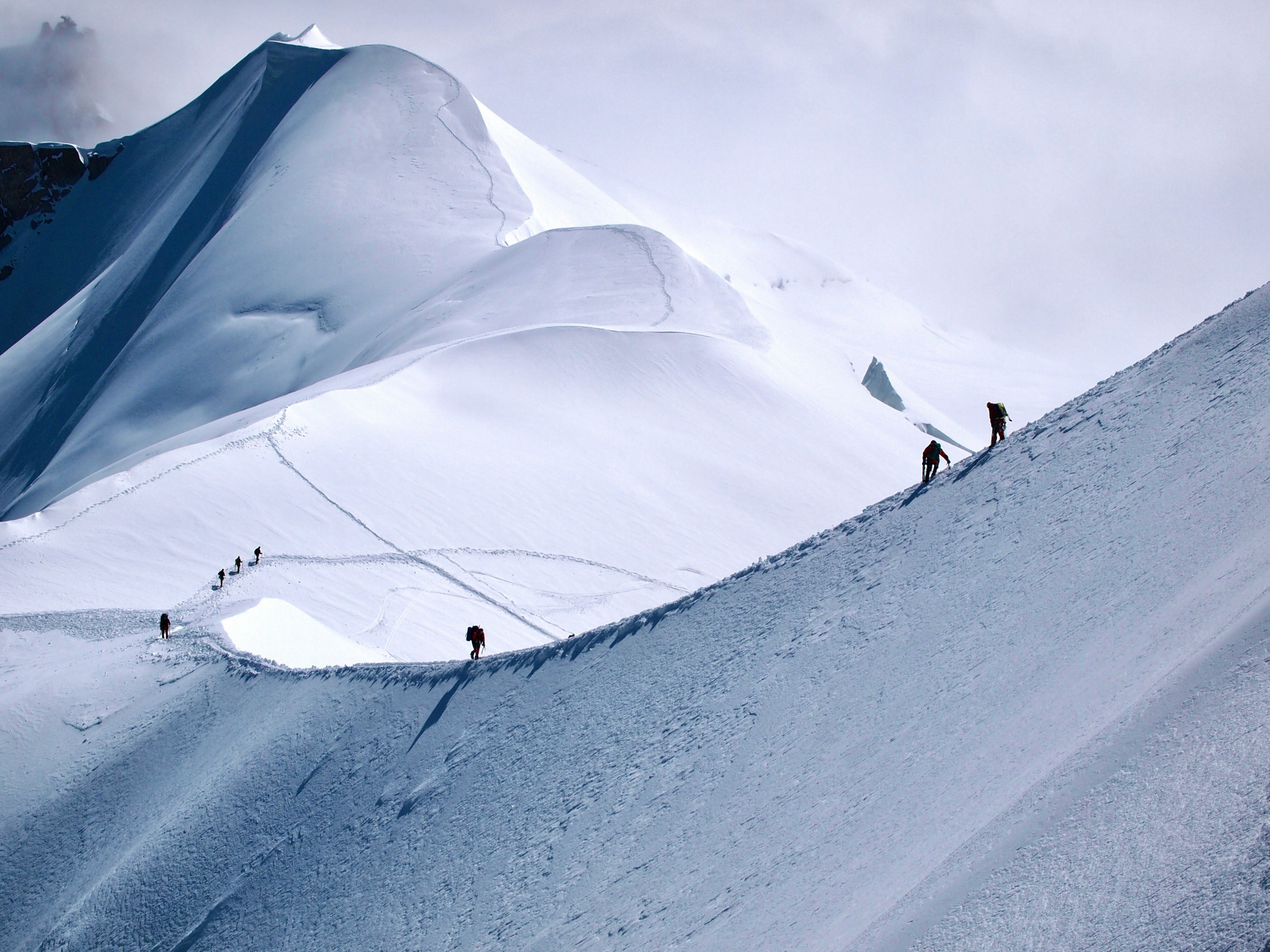 Mountaineers on a snowy ridge, Mont Blanc massif