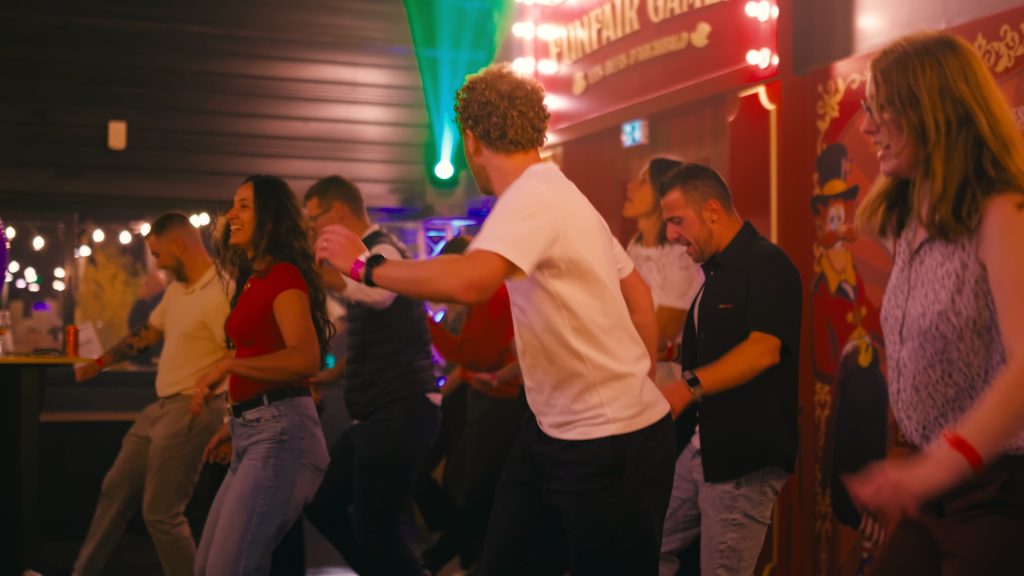 Employees dancing during the anniversary party